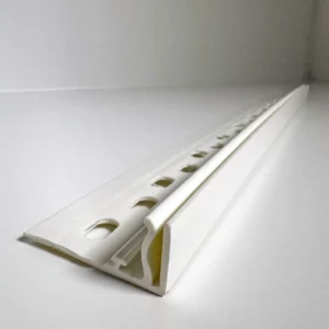 Rail en T A049 avec rebord, à visser